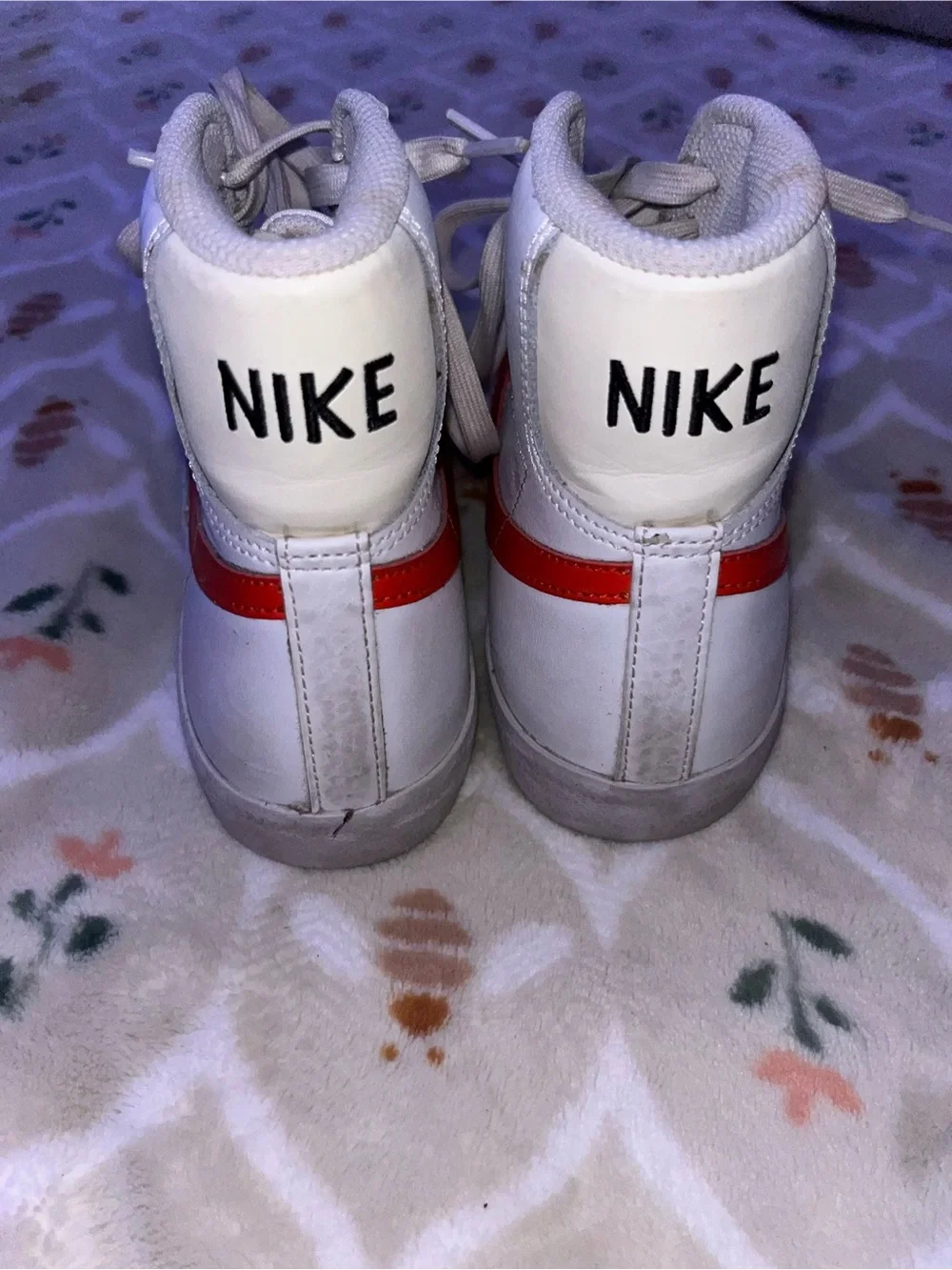 Nike White High-Top Sneakers with Red Swoosh
